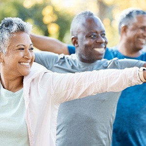 Adults smiling in workout class