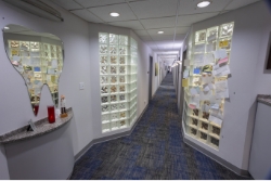 Front desk and hallway leading to dental treatment rooms