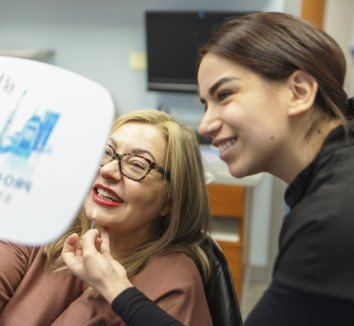 photo of Dr. Thweib with Patient