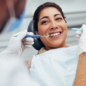 Woman smiling during dental checkup