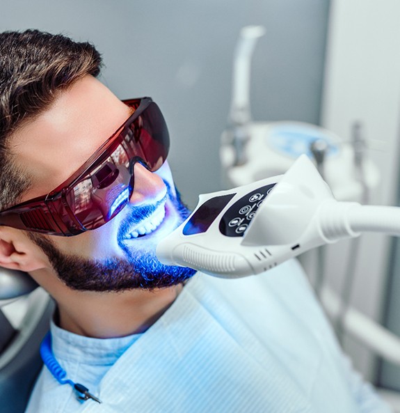 Man having his teeth whitened